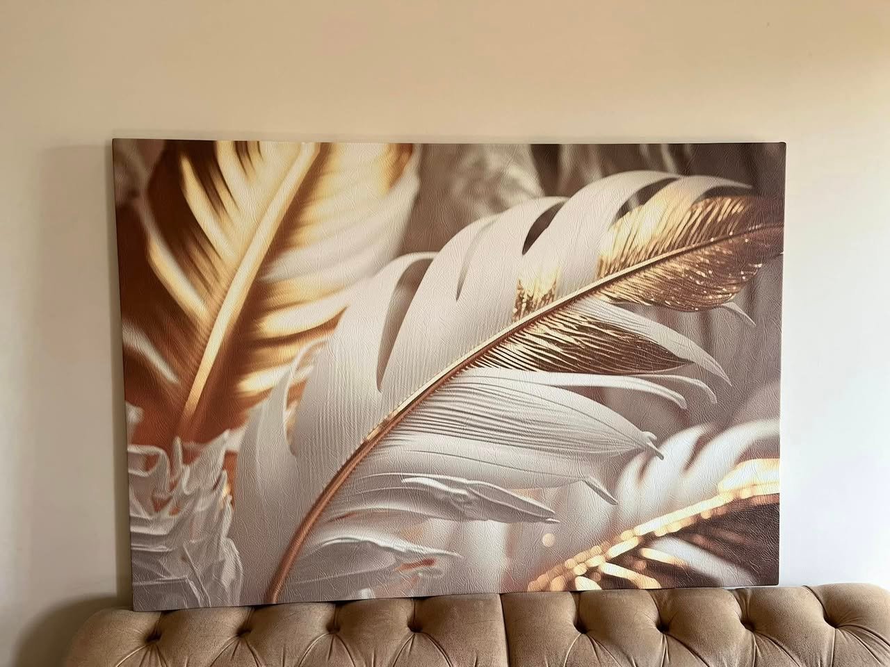 Feather artwork in a real customer home